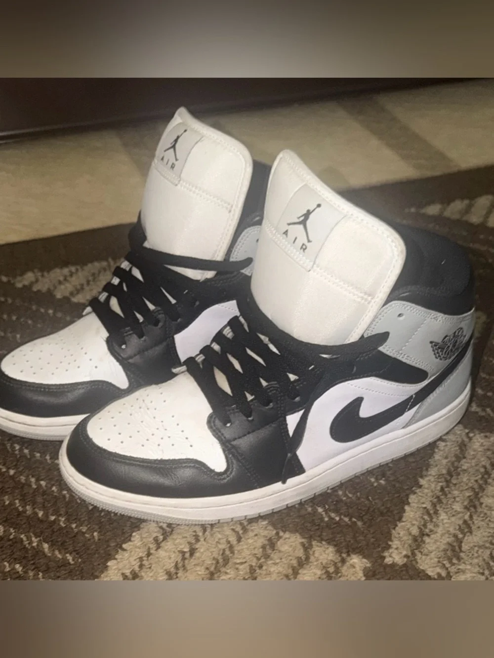 Jordan Black and White High-Top Sneakers